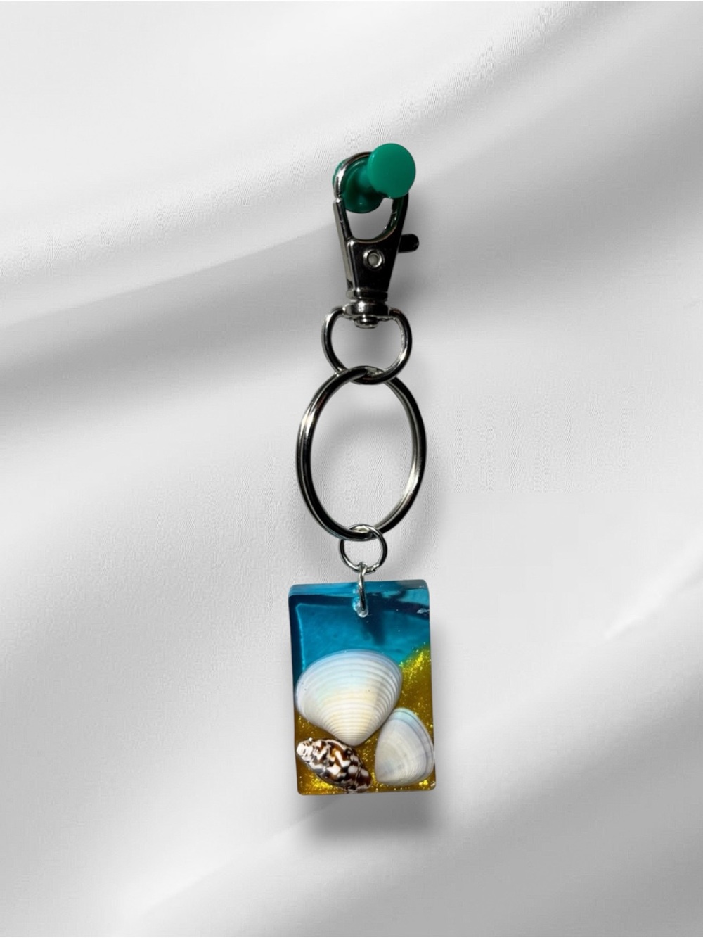 Aqua Resin Keychain with Shell Accent